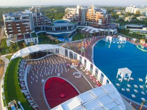 an aerial view of a resort with a large swimming pool at Selectum Luxury Resort Belek in Belek