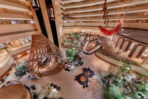 an overhead view of a large building with a lobby at PARKROYAL COLLECTION Marina Bay, Singapore in Singapore