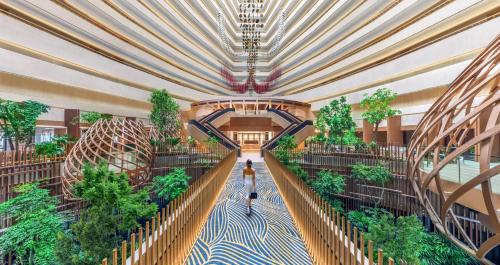 an overhead view of a shopping mall with trees at PARKROYAL COLLECTION Marina Bay, Singapore in Singapore