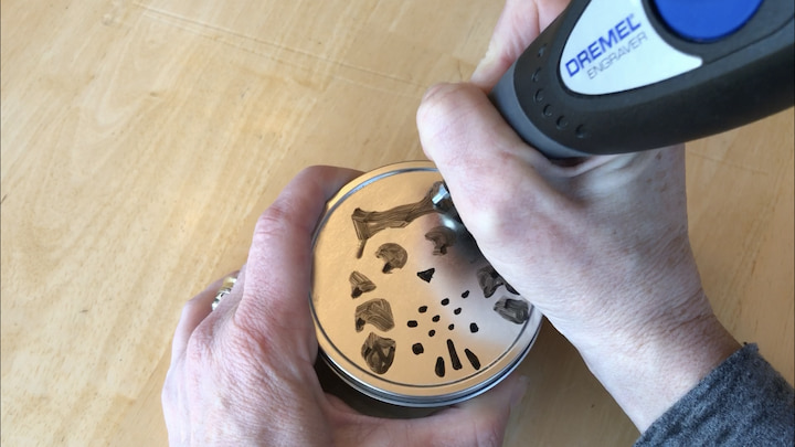 4. use your Dremel engraver to trace the design