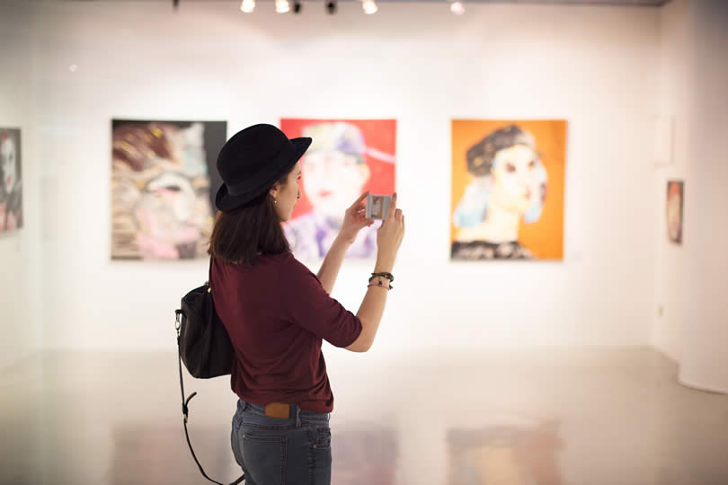 woman visiting a museum in the UK