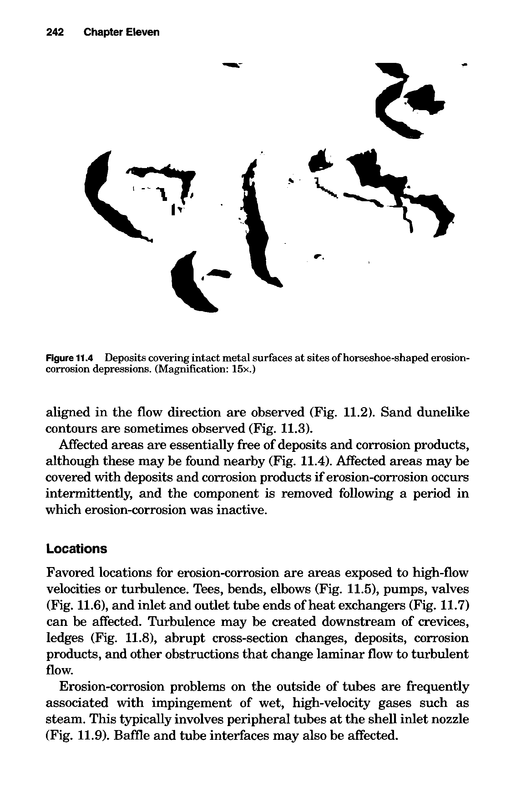 Figure 11.4 Deposits covering intact metal surfaces at sites of horseshoe-shaped erosion-corrosion depressions. (Magnification 15x.)...