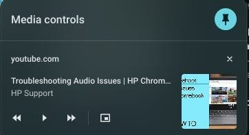 Media controls box, with a pin selected in the upper right corner. The media player shows the media source, youtube.com, the title of the content, the producer of the content, and the thumbnail associated with the content. At the bottom are the following media controls: go back, play, go forward, and fullscreen.