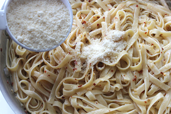 Garlic Parmesan Noodles - perfect side dish with just about any meal. Butter, garlic, noodles, Parmesan, and a few minutes of time needed are all that are needed.