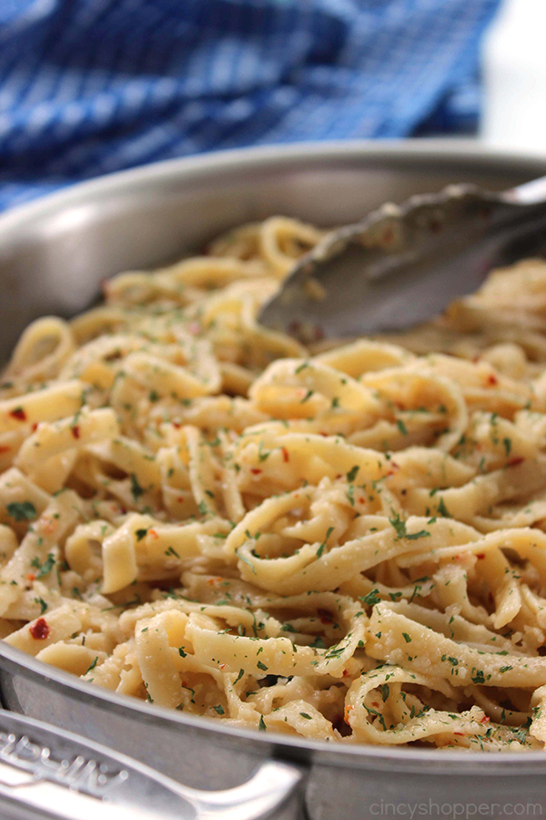 Garlic Parmesan Noodles - perfect side dish with just about any meal. Butter, garlic, noodles, Parmesan, and a few minutes of time needed are all that are needed.