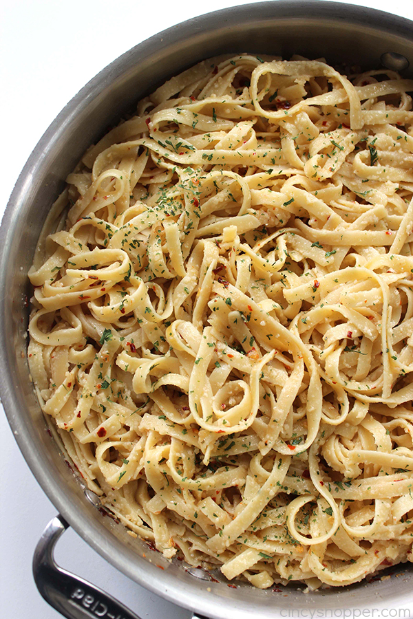 Garlic Parmesan Noodles - perfect side dish with just about any meal. Butter, garlic, noodles, Parmesan, and a few minutes of time needed are all that are needed.