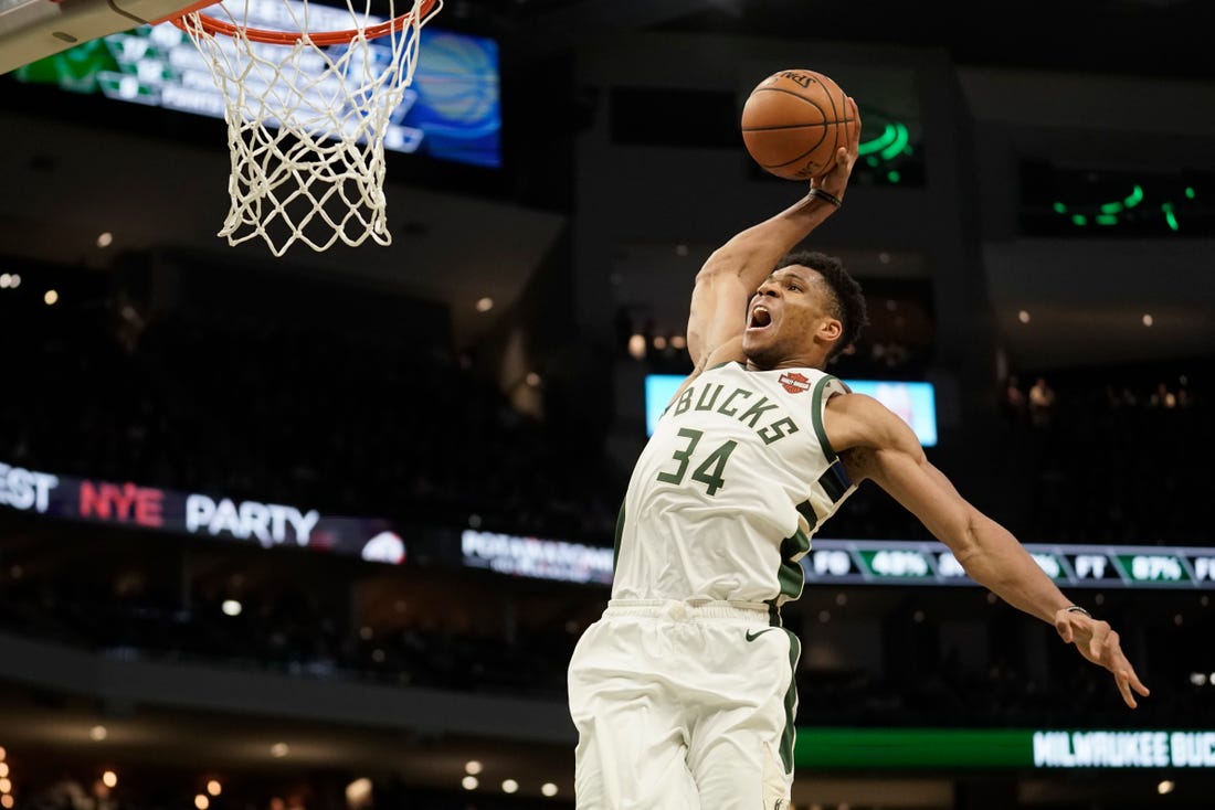 Bucks back on Christmas, led by more complete Antetokounmpo.