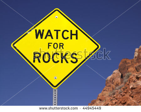 Falling_rocks_sign Stock Photos, Royalty.