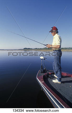 Stock Photo of Man Bass Fishing Using Bass Boat 134334.