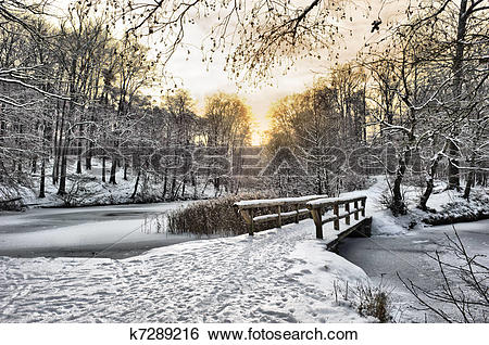 Stock Images of Wooden bridge under snow k7289216.