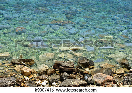 Stock Image of sea water stone beach background k9007415.