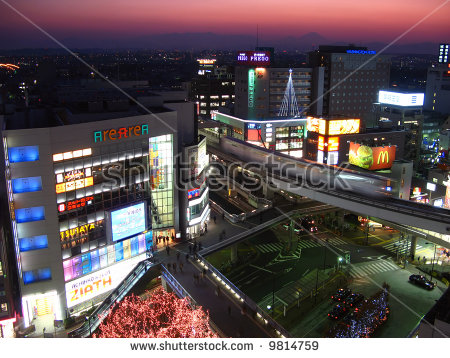 Tachikawa Tokyo Twilight Monorail Train Rushing Stock Photo.