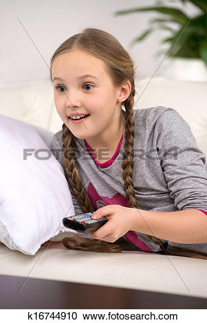 Stock Photography of Cute girl at home. Cheerful little girl.