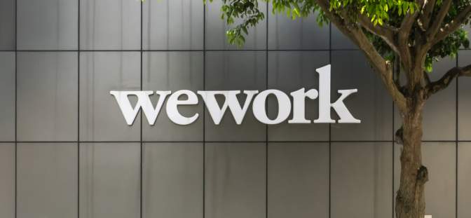 WeWork pwner We Company pushes back IPO amid investors.