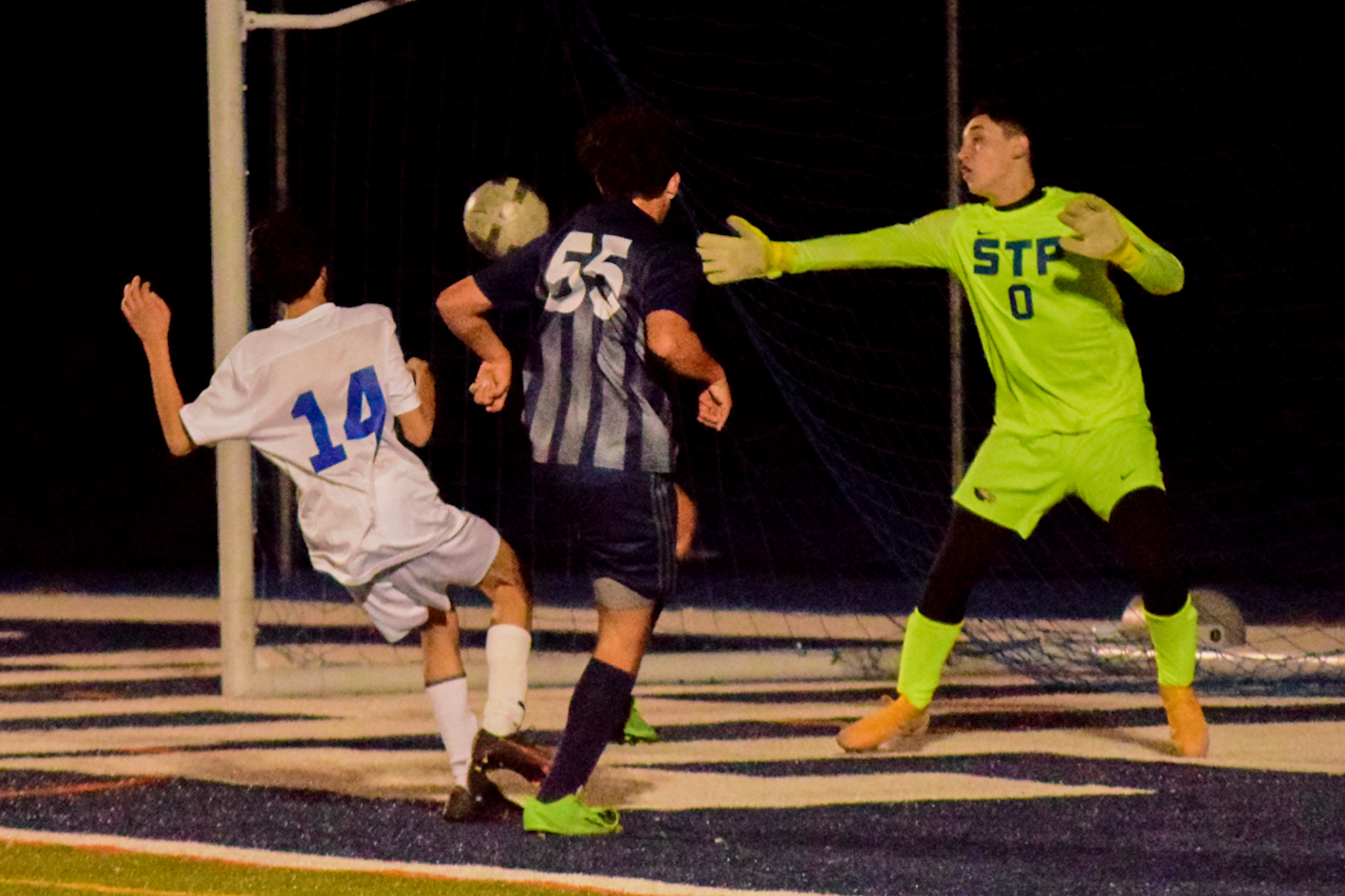 St. Joseph by-the-Sea's Hunter McCarthy watches his first goal slip past St. Peter's goalie Jason Skretvic. (Staten Island Advance/Annie DeBiase)