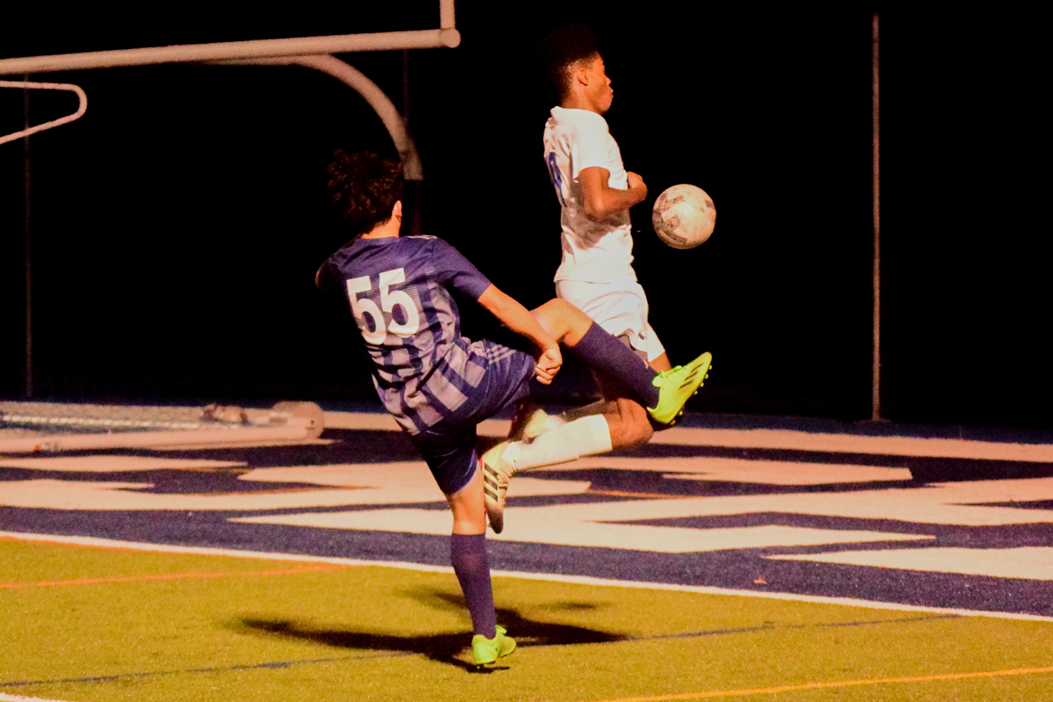 St. Peter's Ekene Emeka, in white, blocks the kick of Sea's Hunter McCarthy. (Staten Island Advance/Annie DeBiase)