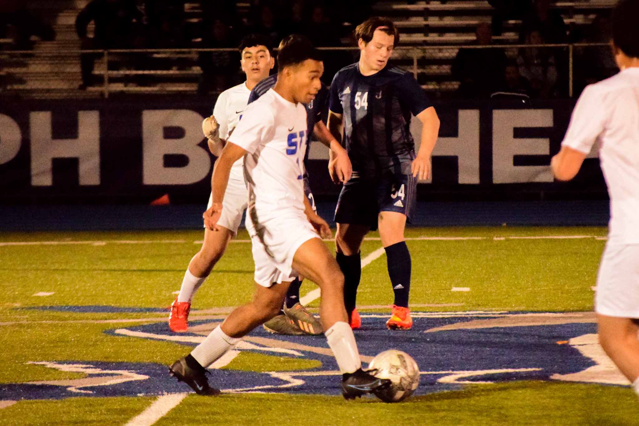 St. Peter's John Egipciacco moves upfield with the ball in a contest against host St. Joseph by-the-Sea. (Staten Island Advance/Annie DeBiase)