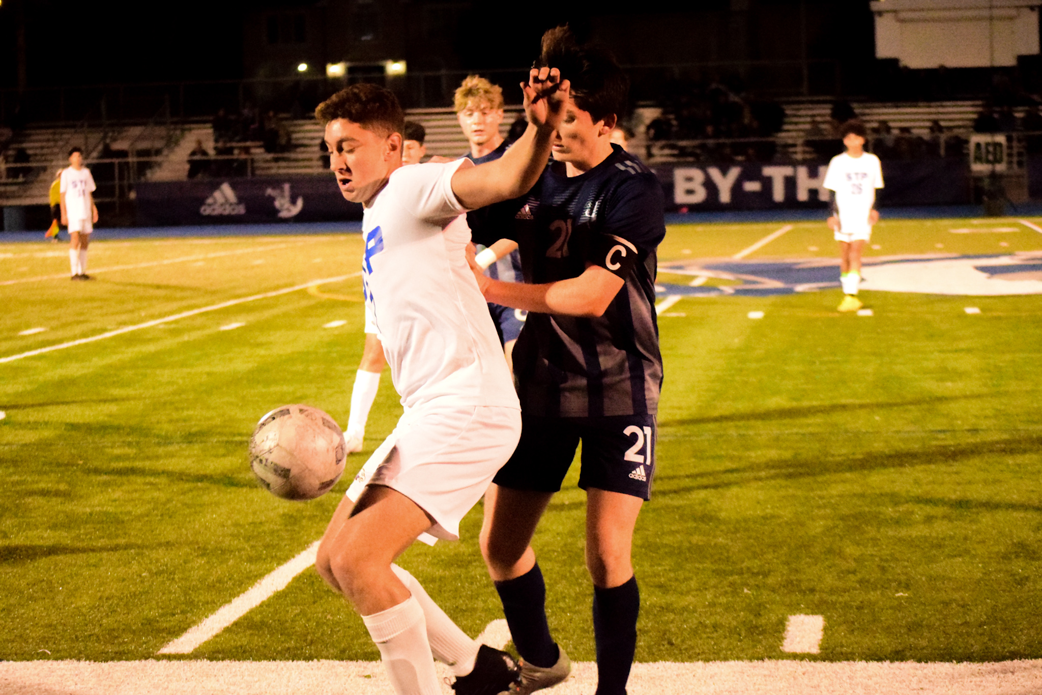 St. Peter's Guiseppe Sarrubo bodies the ball as St. Joseph by-the-Sea's Aidan Hayes applies pressure. (Staten Island Advance/Annie DeBiase)