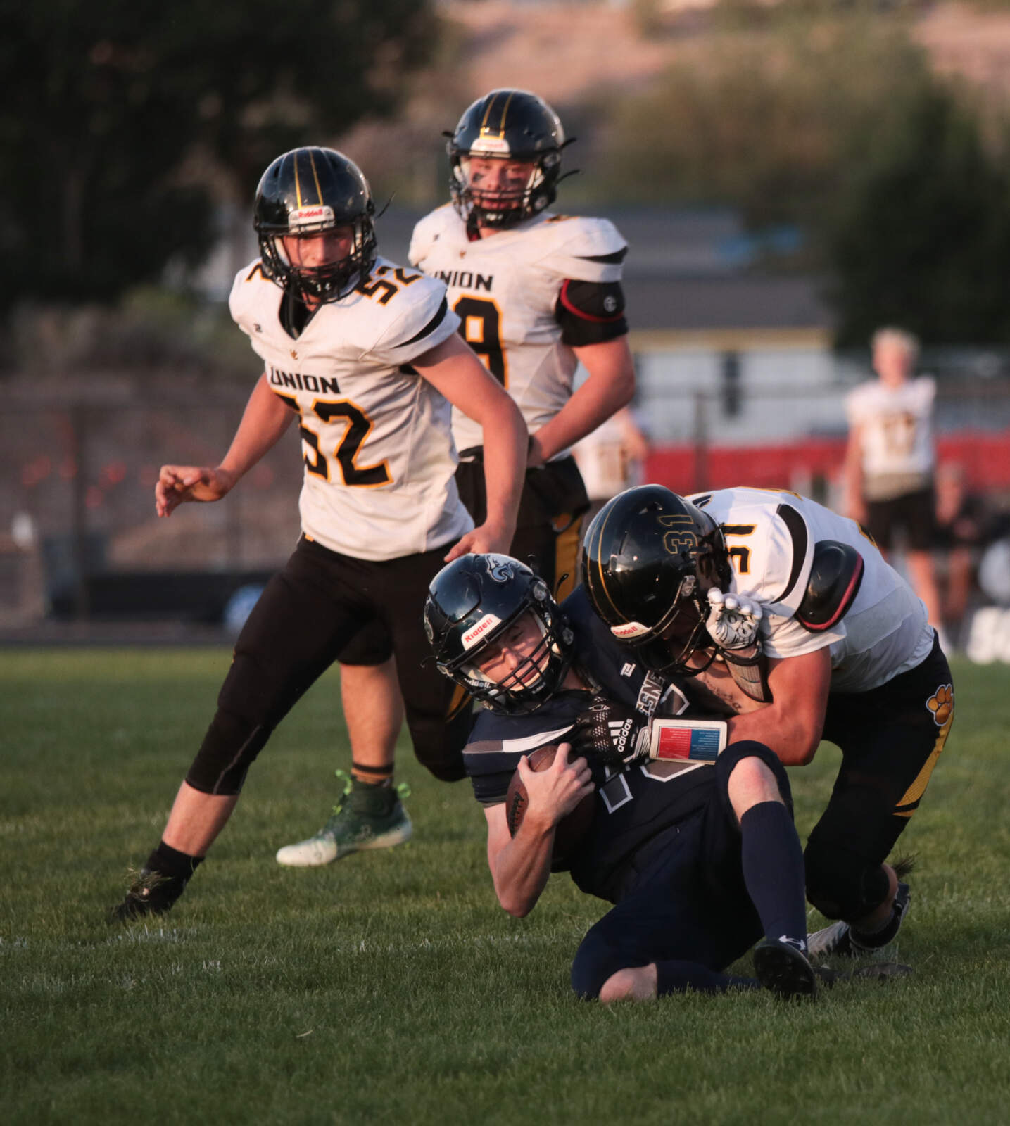 Justin Gilman makes a tackle