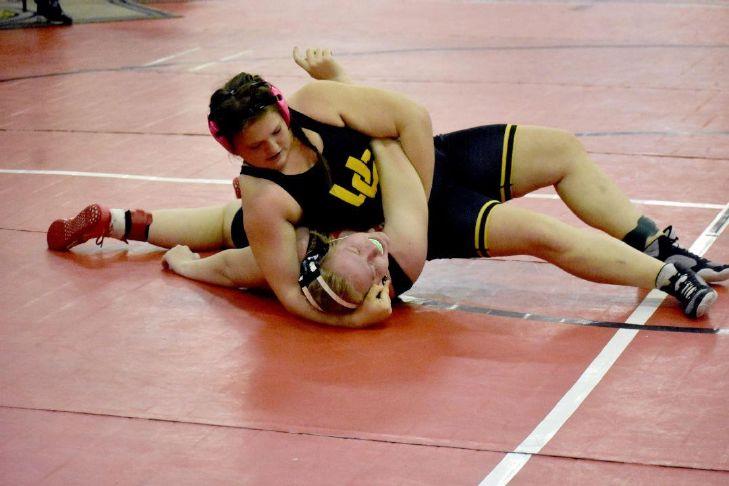 Jasmine Brown pins Emma Jonansen from North Sanpete in the Tournament of Champions at Western Park in Vernal