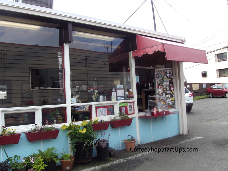 This Drive-Thru Coffee Stand is a Hybrid Cafe (Where people can order inside and through the drive-thru windows