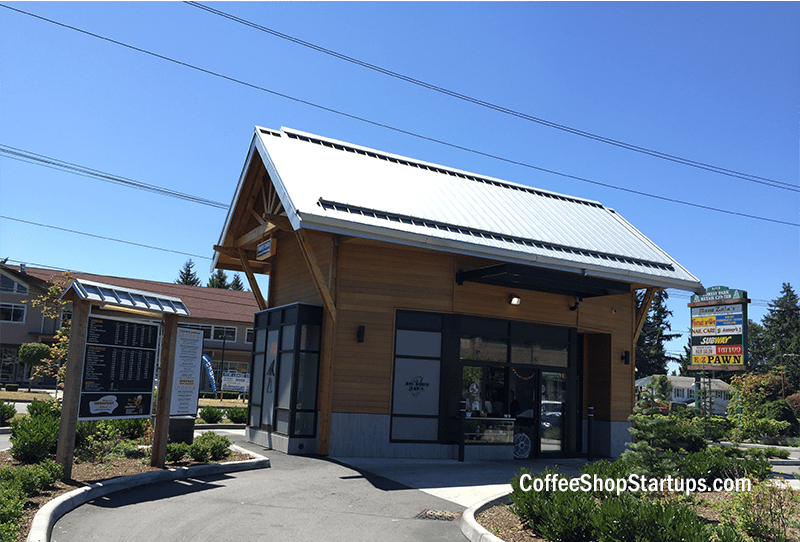 A large drive-thru coffee shop with intercom