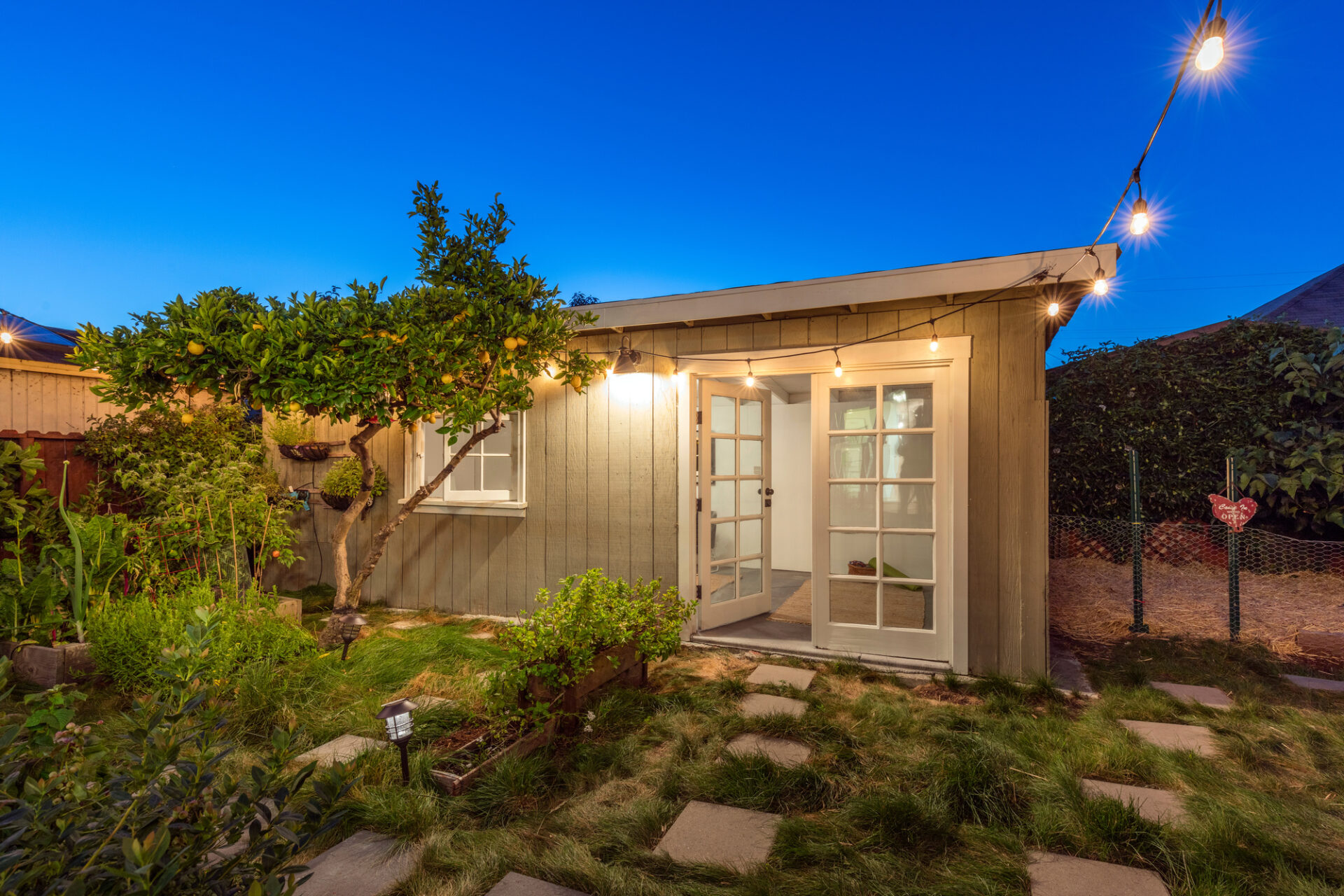 Modern Tiny Home Guest House at twilight.