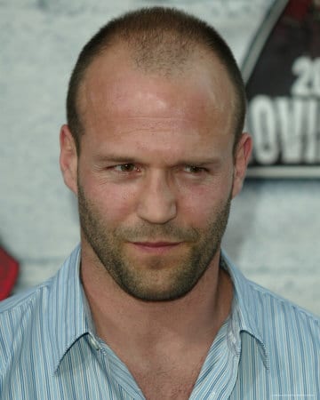 Jason Statham head shot balding buzz cut.