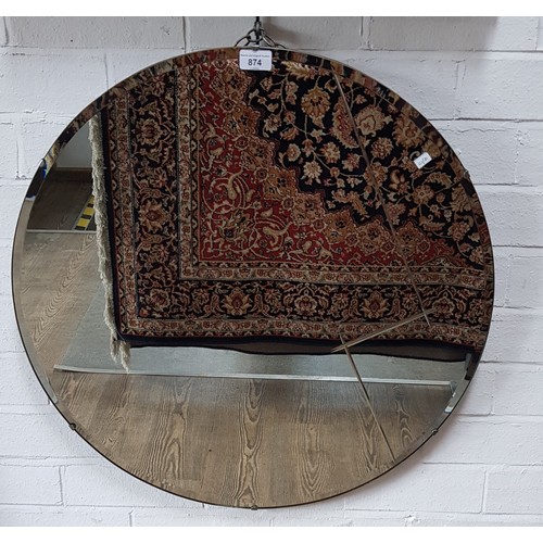 A 1930s Art Deco etched glass wall mirror, diameter 66cm.