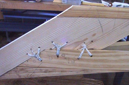 Lash the Stem and Stern Boards to the Gunwales