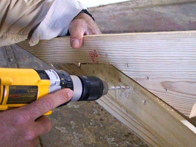 Drill Lashing Holes for Lashing the Stem and Stern Boards to the Keelson