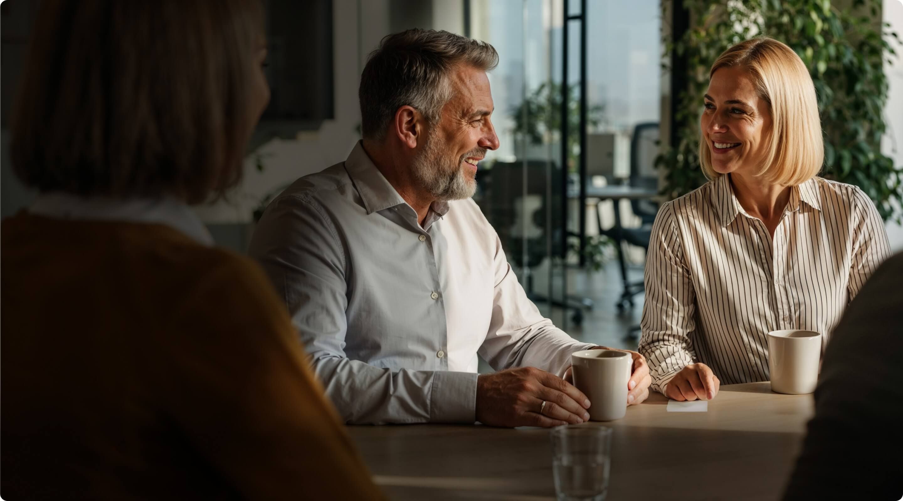 man and a woman having coffee