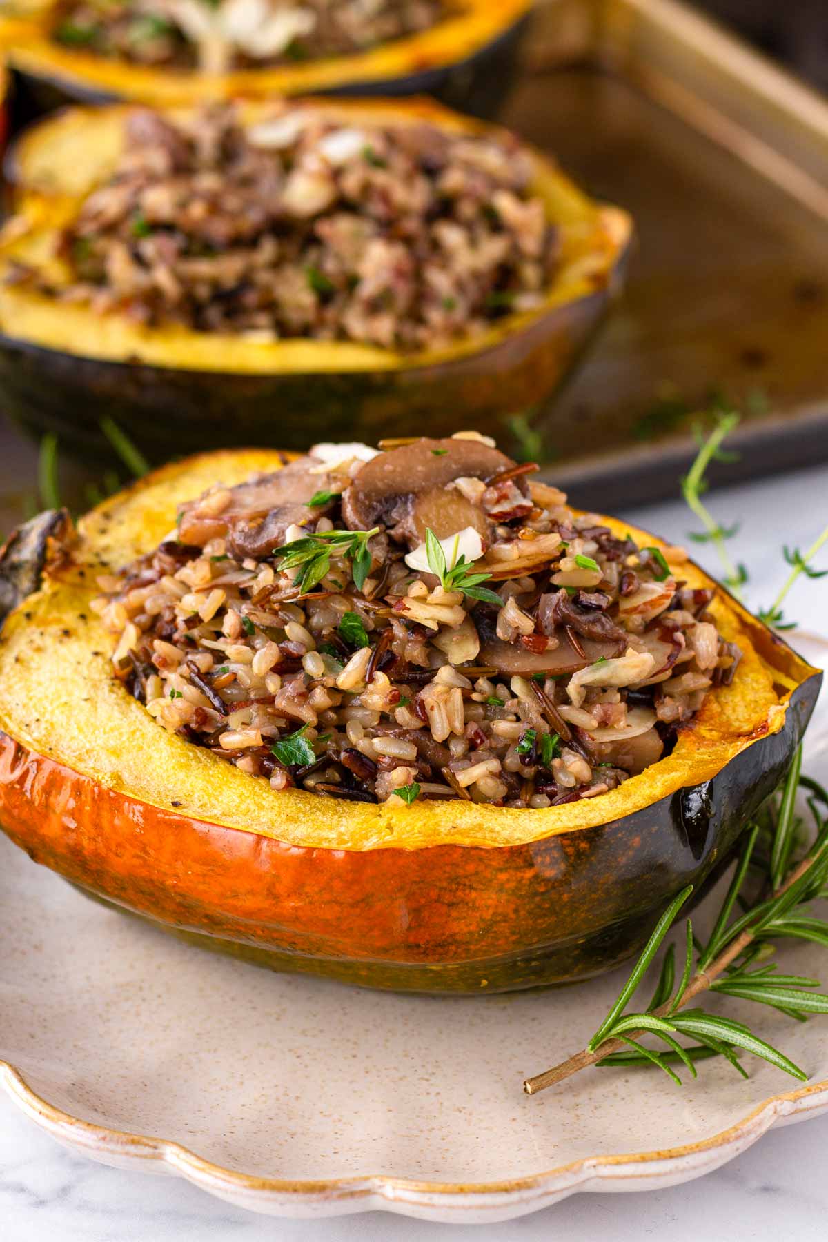 wild rice pilaf stuffed acorn squash on plate