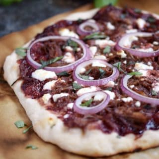 The sweet and tangy combination on this Cherry Bourbon Barbecue Pork Pizza will make this a family favorite | cookingwithcurls.com