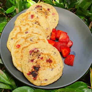 Almond and oat pancakes with lemon and berries