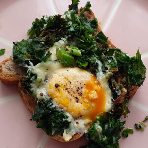 Baked egg with kale and cheese