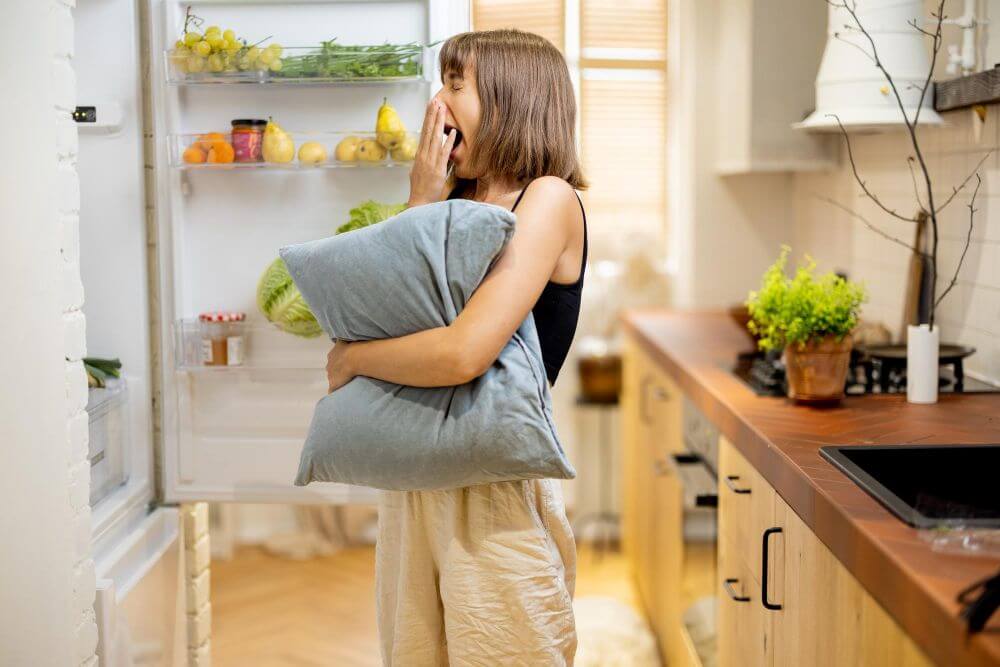 A woman Choosing a Solar-Powered Refrigerator