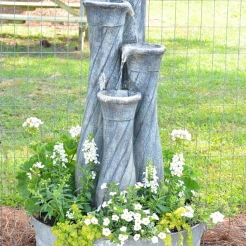 Galvanized tub fountain and planter | cottage at the crossroads