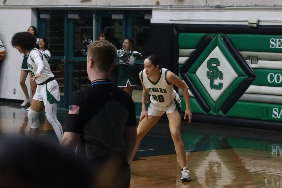 Sophomore Alianna Colon guards and closely watches what the other team is going to do. 