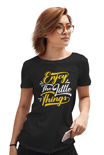 a women wearing a black t-shirt with enjoy little things print on it