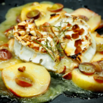 Oven Baked Brie with Honey, Apples, Grapes, Peacans and Rosemary Allison Antalek Cut2therecipe