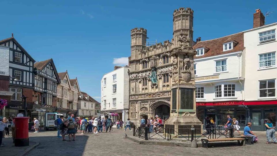 Medieval gate in a small square in the city centre