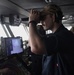 Sailor Stands Lookout At Sea