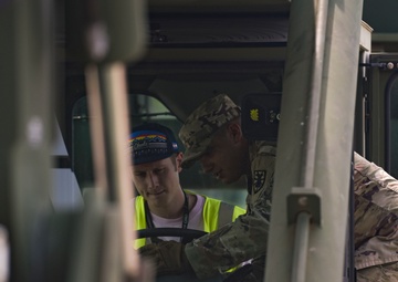 Soldiers unload cargo of knowledge to local dockworkers