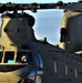 Crew guides CH-47 Chinook for sling-load training support at Fort McCoy