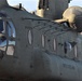 Crew guides CH-47 Chinook for sling-load training support at Fort McCoy