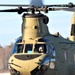 Crew guides CH-47 Chinook for sling-load training support at Fort McCoy