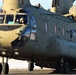 Crew guides CH-47 Chinook for sling-load training support at Fort McCoy