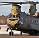 Crew guides CH-47 Chinook for sling-load training support at Fort McCoy