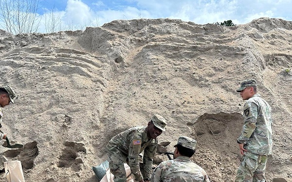 153rd Financial Management Support Battalion fills sandbags to reinforce armory against Hurricane Milton